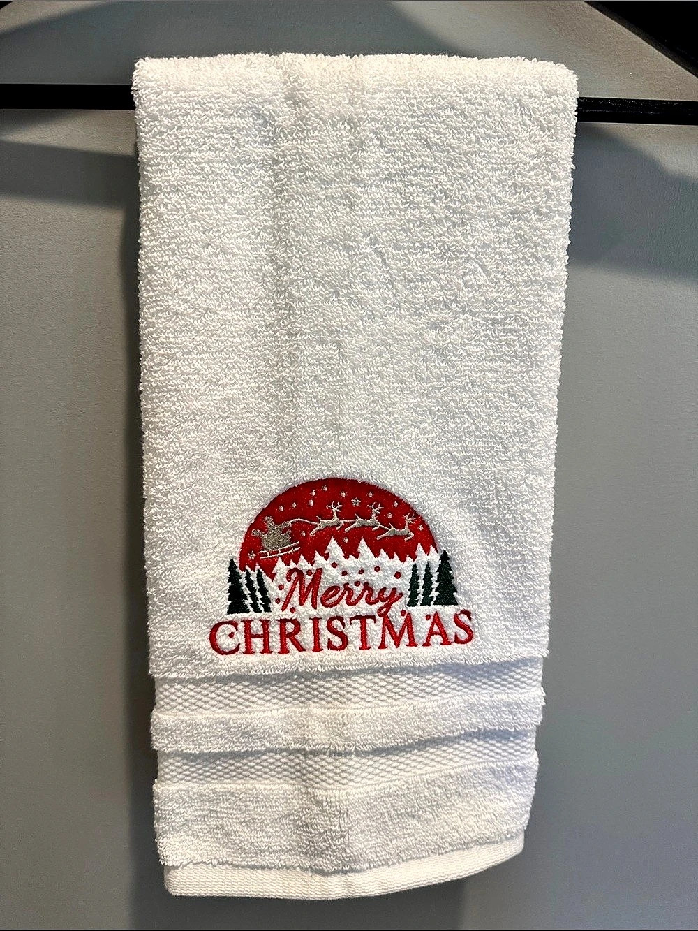 NWOT Grandeur Hospitality Merry Christmas embroidered hand towel.